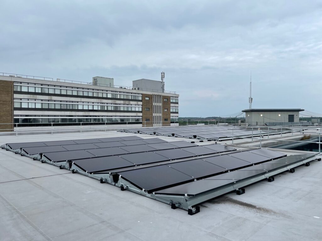 Rows of solar panels are fixed to the roof of Newcastle Hospitals' Regent Point offices in Gosforth 
