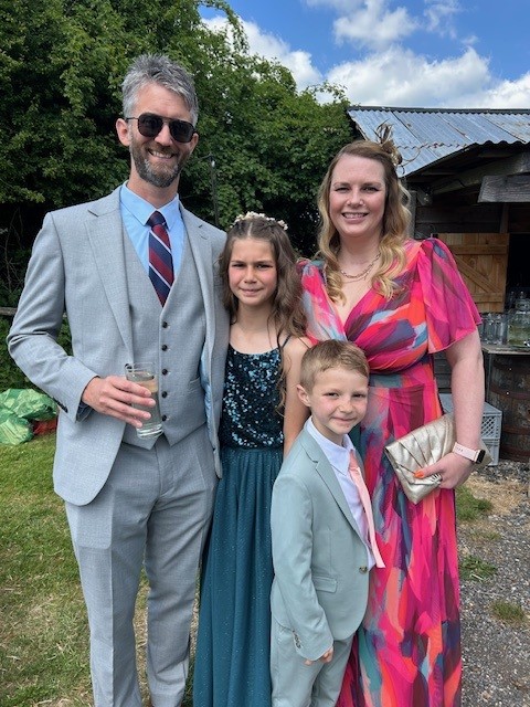 Rebecca Griffin is pictured with her two children and husband 