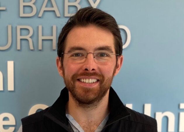 A headshot of Mr Jason Powell