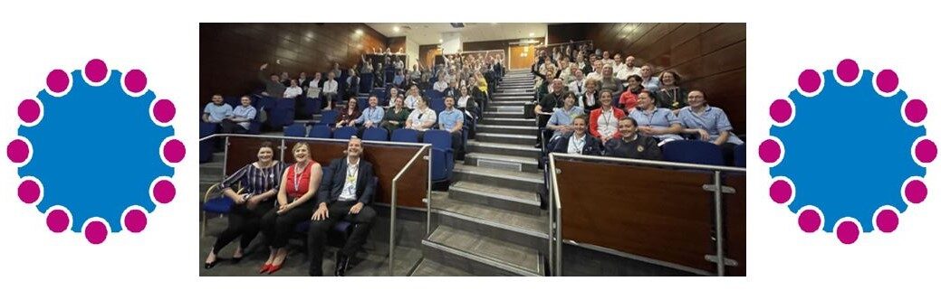 A conference room full of people