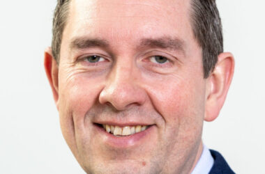 A headshot of Rob Harrison